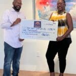 Stefan Carty and Danica David _Donation to SCECHS