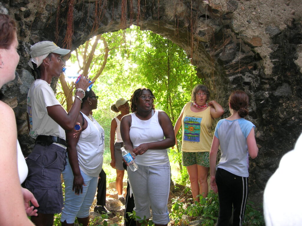 A group of hikers inside the Estate Parasol sugar mill. (Photo by Olasee Davis)