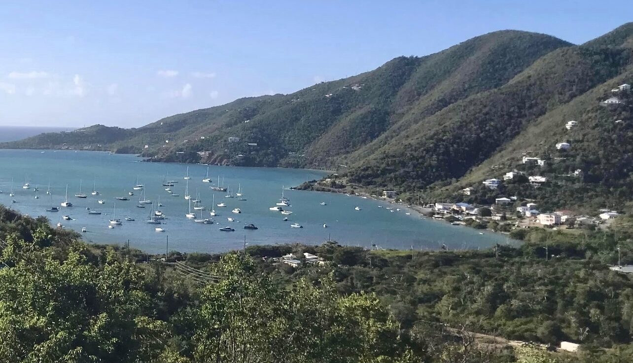 Photo of Coral Bay harbor shows site of Summer’s End marina on the right. (Photo by Elizabeth Escardo)