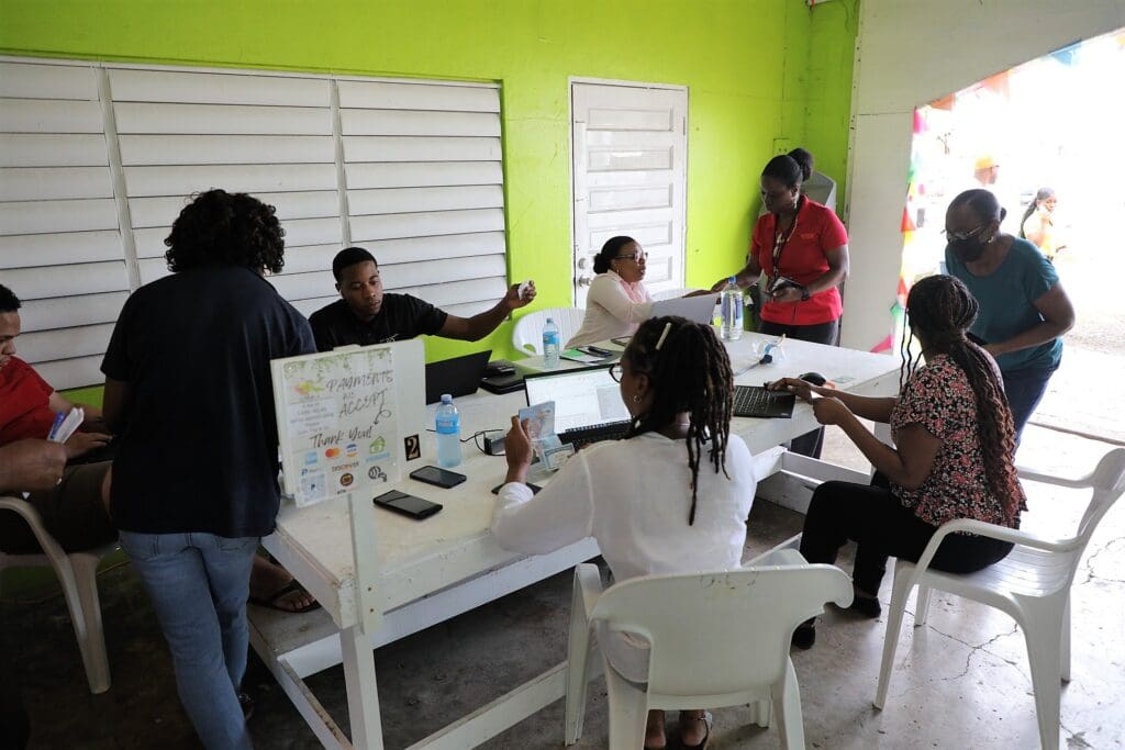 Government workers distribute Social Security stipend checks on Tuesday at the Rudolph Schulterbrandt Agriculture Fair Ground on St. Croix. (Photo courtesy of OMB)