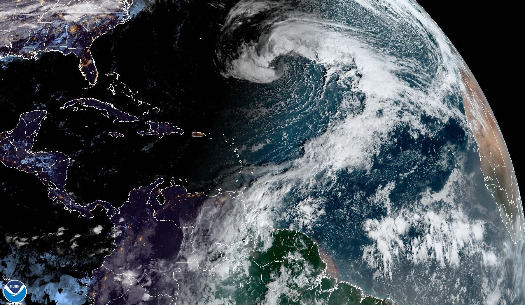 Satellite imagery of the Atlantic on Wednesday. A strong weather system in the central Atlantic will contribute to rough seas across the Atlantic and the Caribbean. The National Hurricane Center is monitoring the system for potential development. (Photo courtesy NHC)