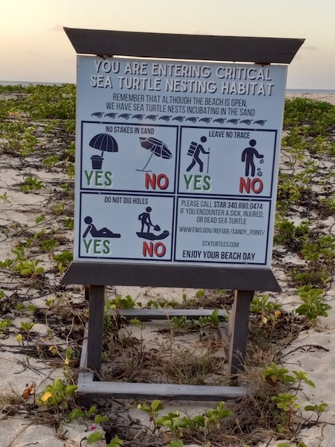 Example of signage on nesting sea turtle beaches. This is a removable sea turtle signage at Sandy Point National Wildlife Refuge. The same concept can be used on nesting beaches in the Virgin Islands National Park on St. John. (Photo by Olasee Davis)