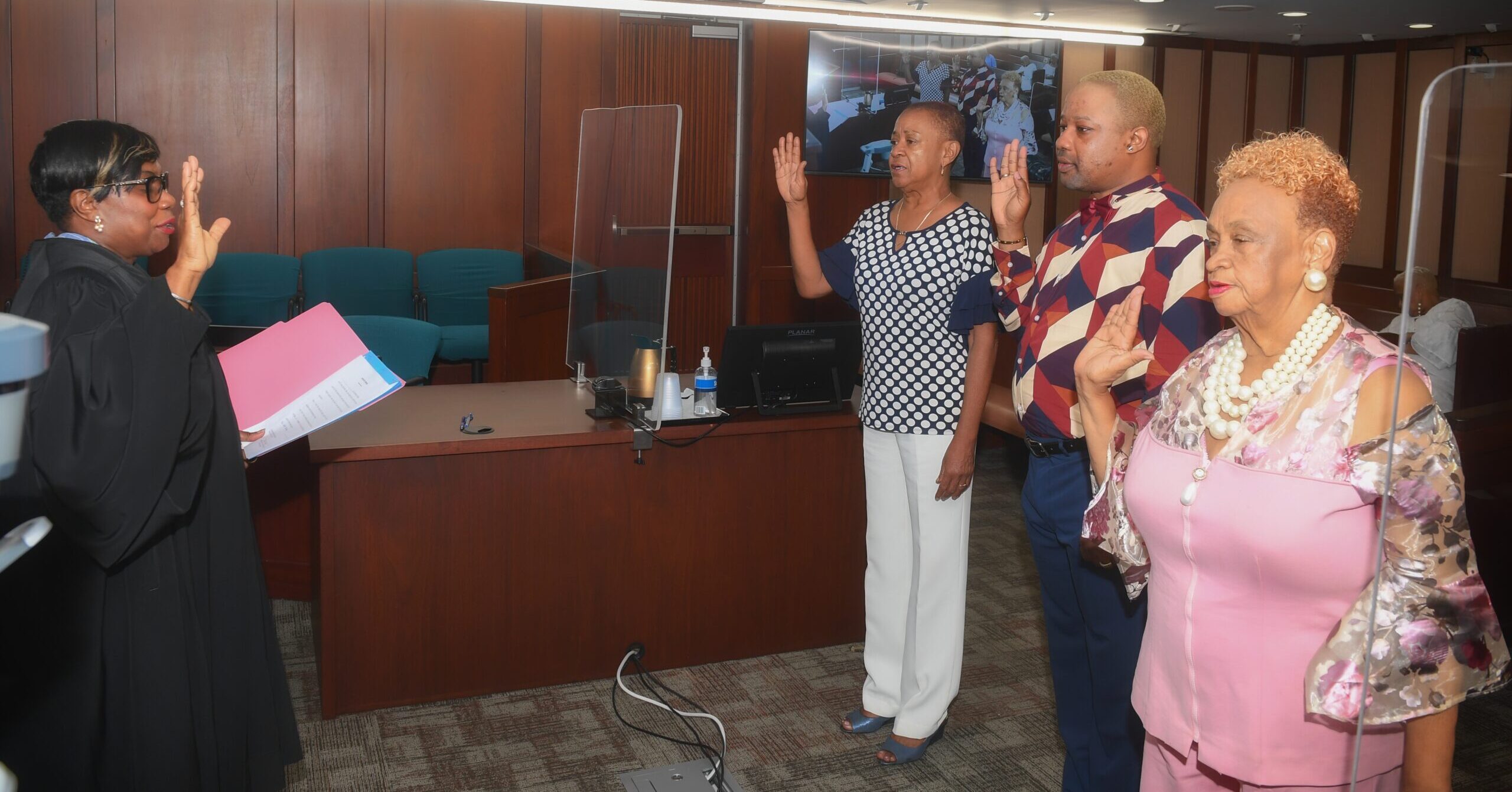 V.I. Superior Court Presiding Judge Debra S. Watlington administered the oath of office for the St.  Thomas district members: Kyza A. Callwood, Ph.D., Judy M. Gomez, Arah C. Lockhart, and Nandi Sekou. (Photo courtesy Board of Education)