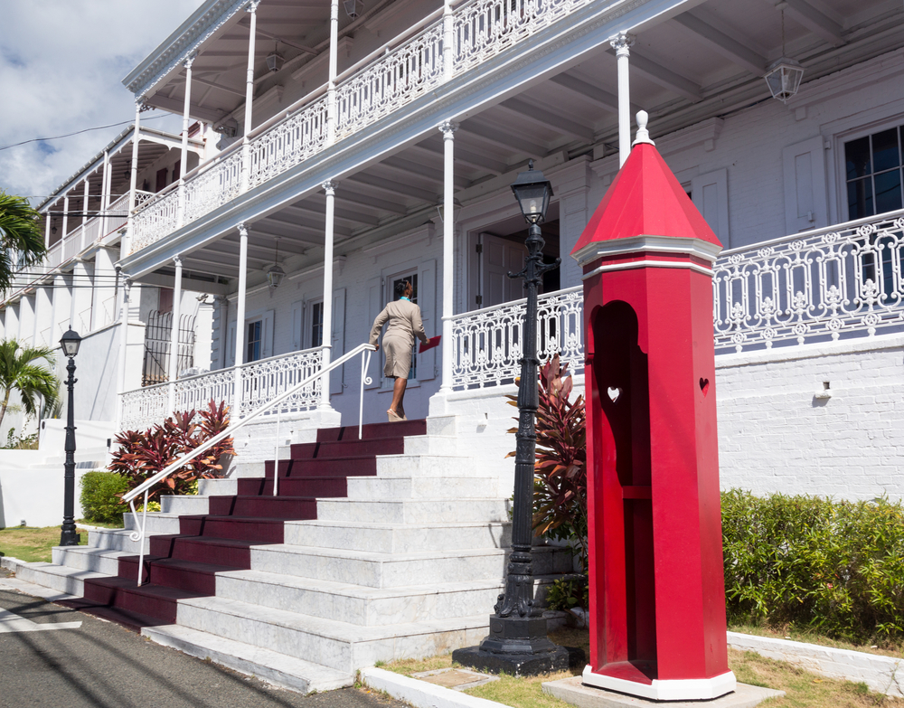 A woman enters Government House in Charlotte Amalie, St. Thomas. (Shutterstock photo)