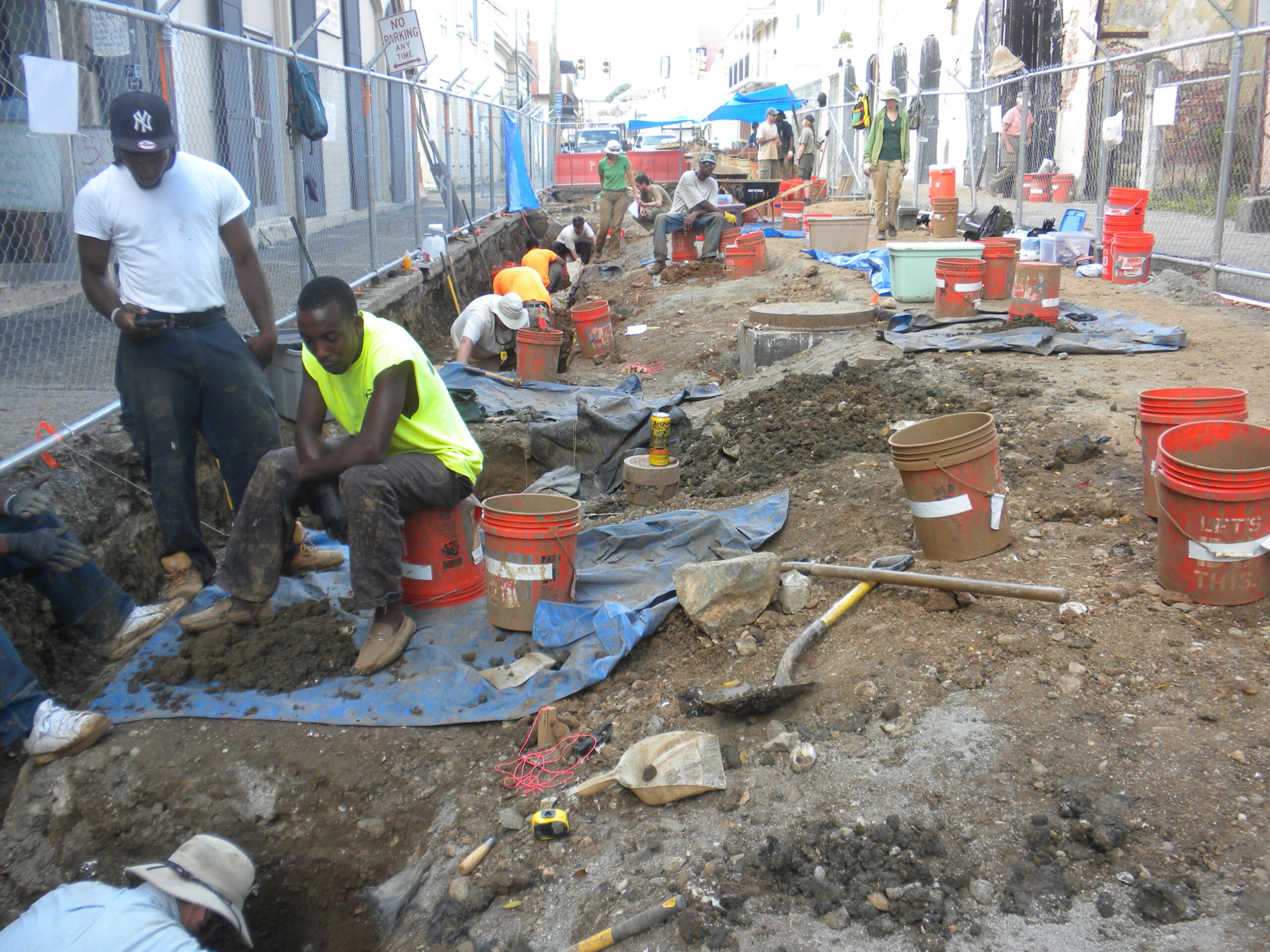 Workers sift through the dirt below Main Street in 2014 on St. Thomas. (Photo by Emily Lundberg)