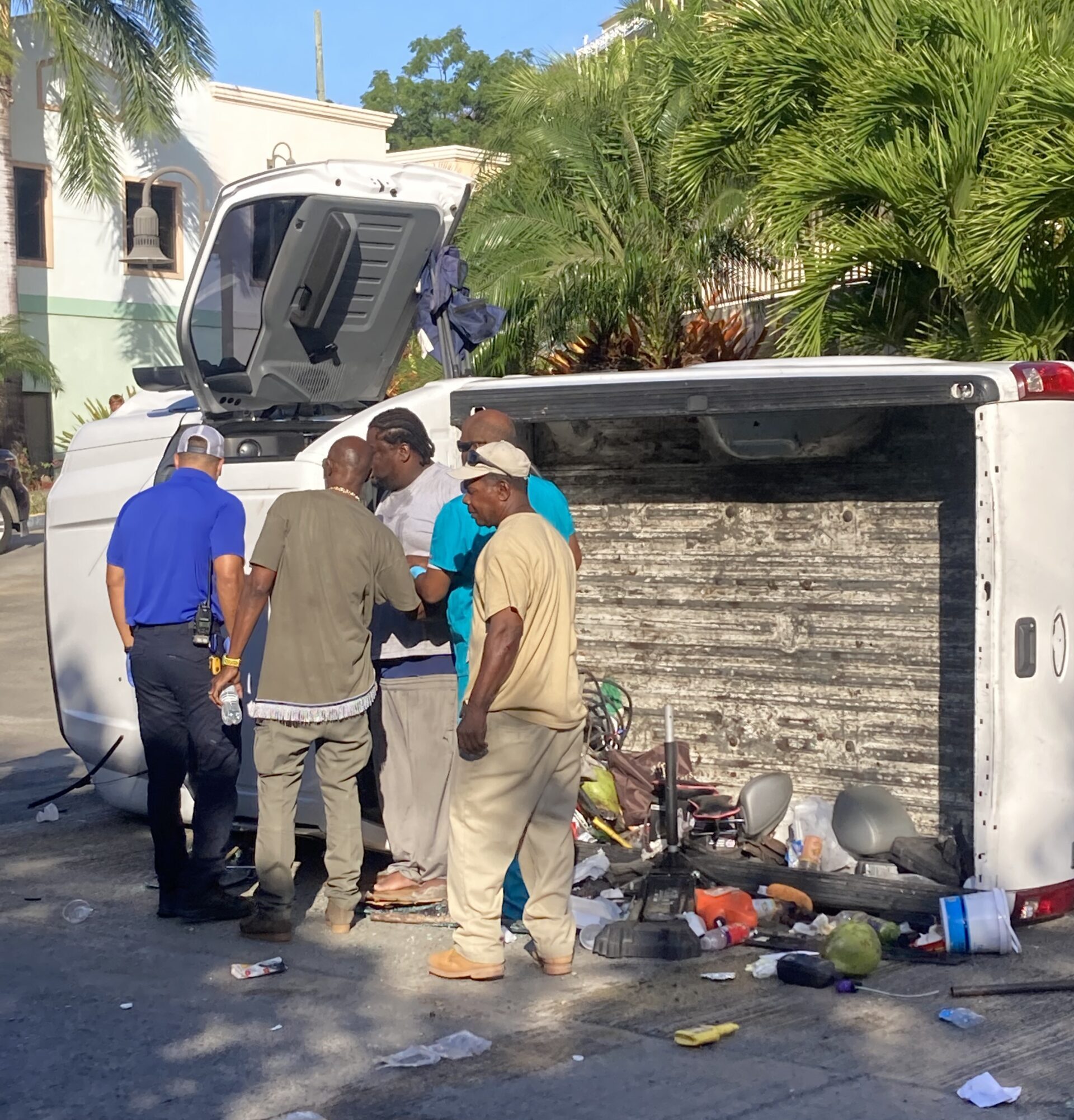 Responders check on the driver of the vehicle following the accident Tuesday morning. (Submitted photo)