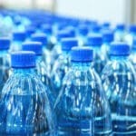 Closeup,On,Mineral,Water,Bottles,In,Raw,And,Lines