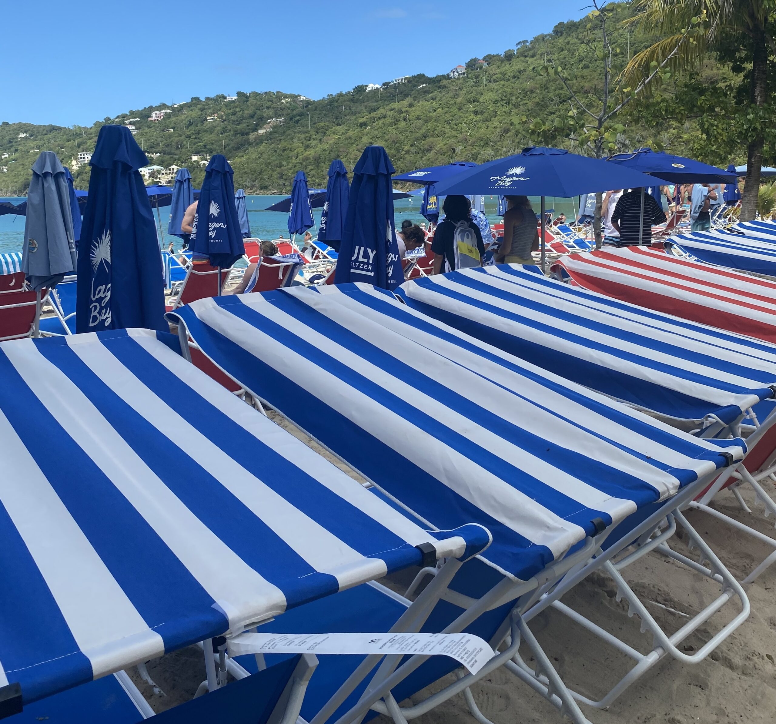 Lounge chairs line the beach at Magens Bay last month on a day that five cruise ships called on St. Thomas. (Photo by Jason Budsan)