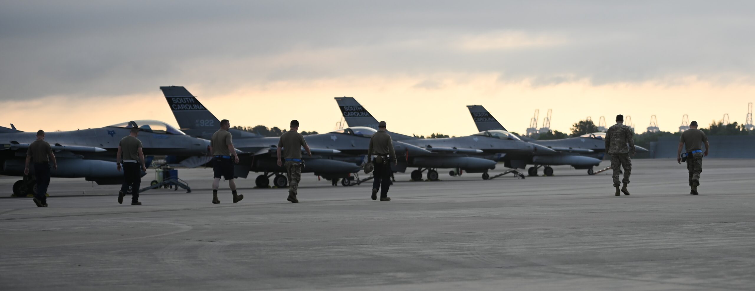 U.S. Airmen with the 169th Aircraft Maintenance Squadron, South Carolina Air National Guard, conduct a Foreign Object Debris walk on the flightline during Sentry Savannah hosted by the Air Dominance Center in Savannah, Georgia, May 9, 2024. Sentry Savannah is the Air National Guard’s premier 4th- and 5th-gen fighter integration exercise, with this year’s event involving more than 775 participants and 40 aircraft from six units. (U.S. Air National Guard photo by 2nd Lt. Nicole Szews)