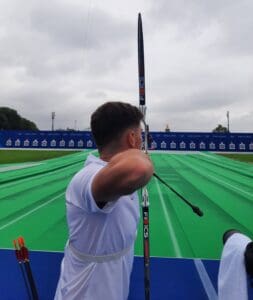 Nicholas D’Amour of St. Thomas practices at the Esplanade des Invalides archery venue in Paris, France. (Photo by Kevin D'Amour)