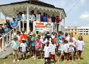 At the end of the competition, all of the anglers and adults, gathered for a photo before lunch and prizes. (Source photo by Susan Ellis)