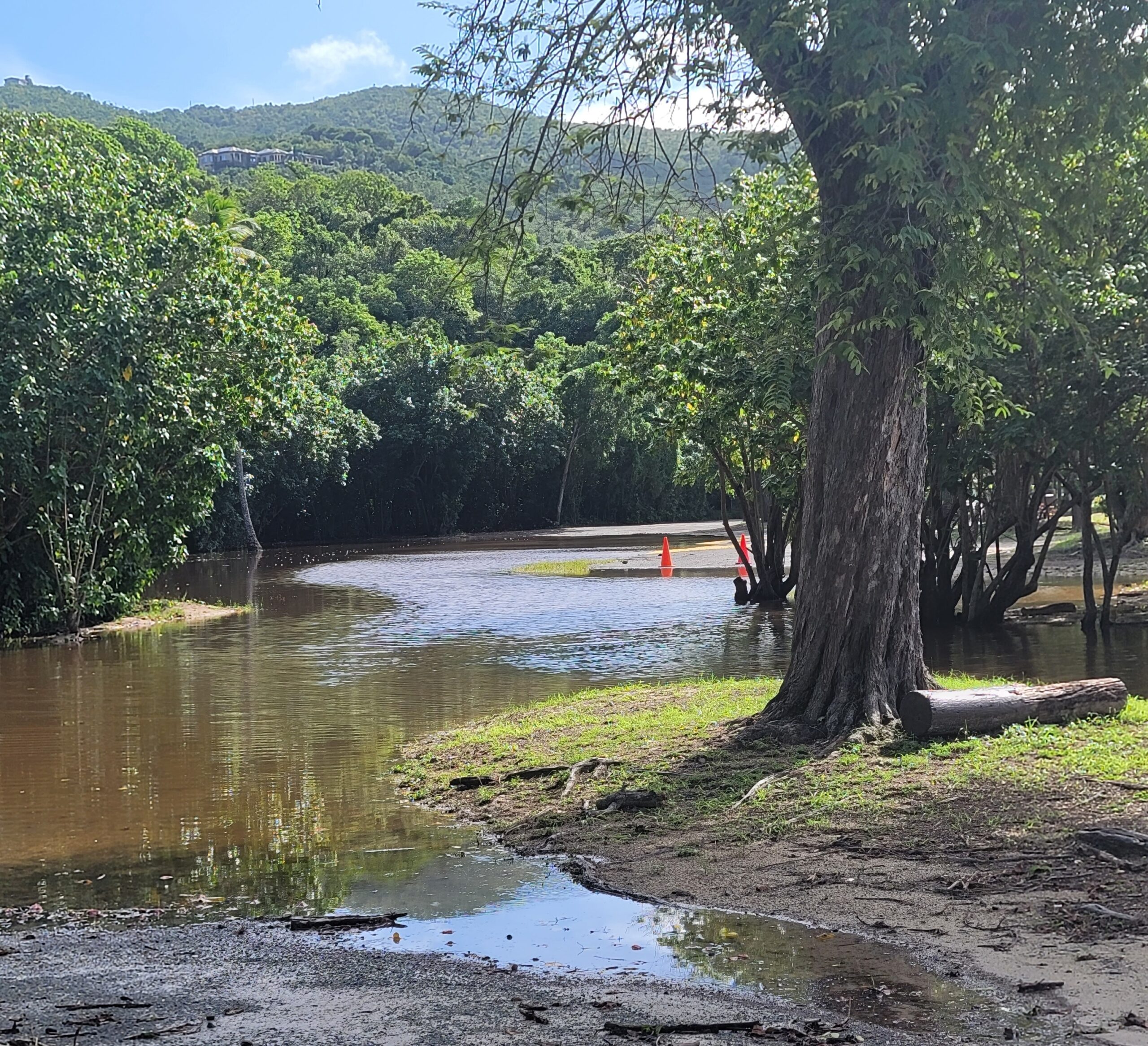 Much of the parking lot to the east of the entrance was flooded Friday after days of rain. (Submitted photo)