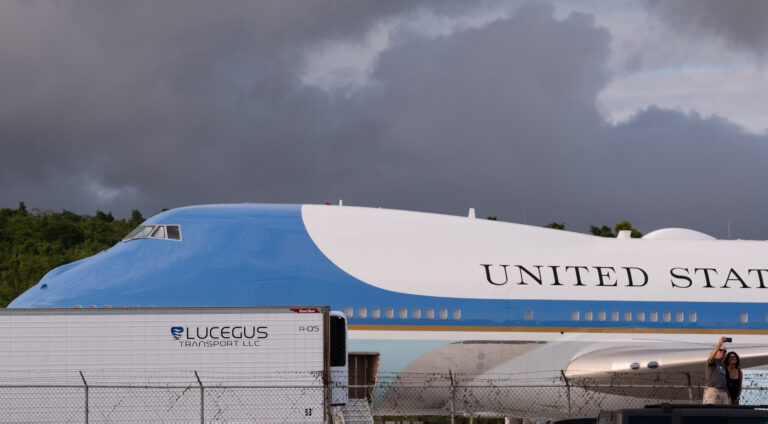 Photo Focus: Residents and Visitors Catch Glimpse of Air Force One After Biden Lands for Year-End Visit