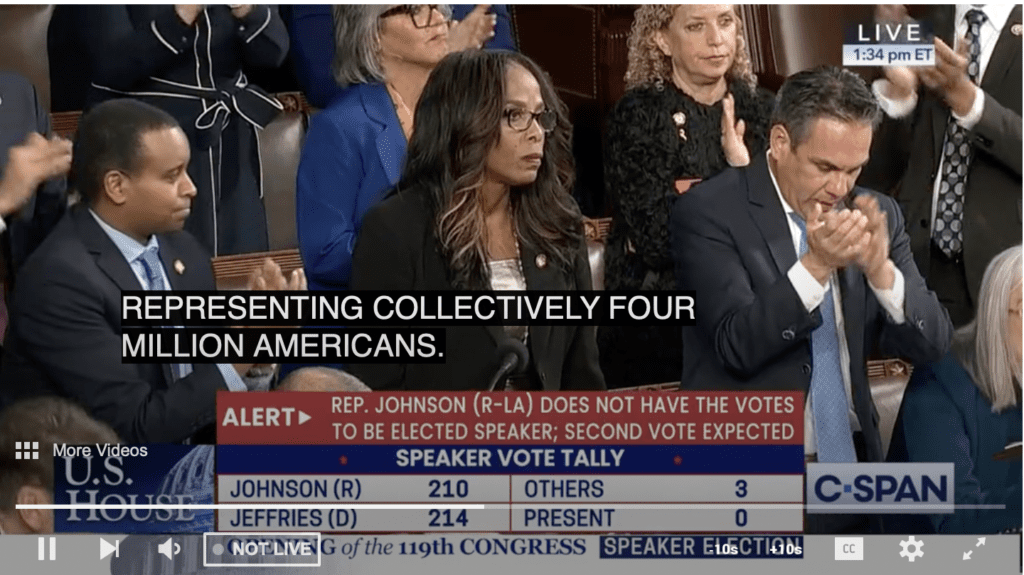 Her colleagues stand and applaud as Delegate to Congress Stacey Plaskett calls out the lack of territory rights during the vote for the speaker of the House on Friday in Washington, D.C. (Screenshot from C-Span)