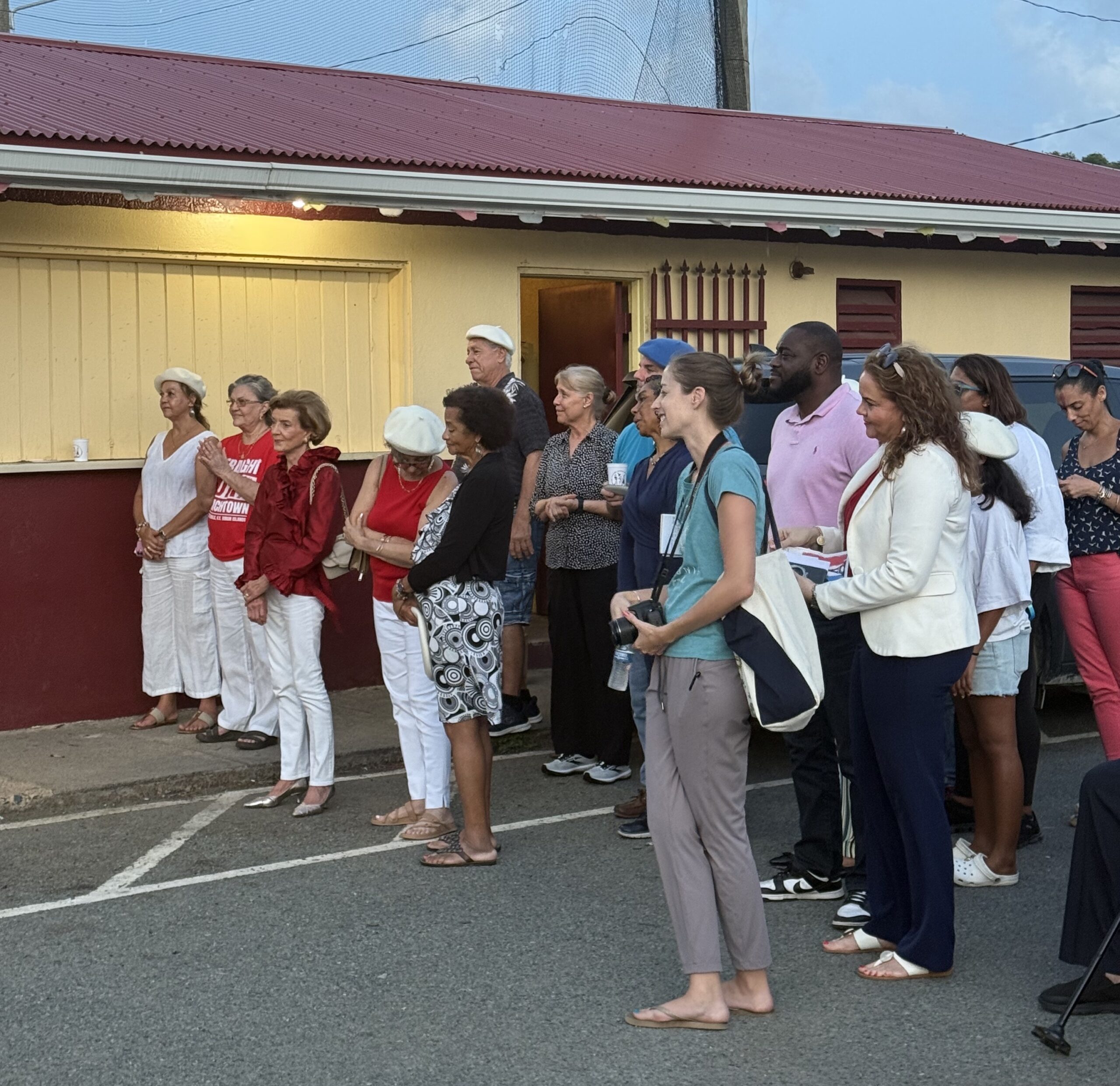 Community members gathered in Frenchtown as the Bastille Day program got underway, reflecting on heritage and tradition. (Source photo by Melissa Bryan)