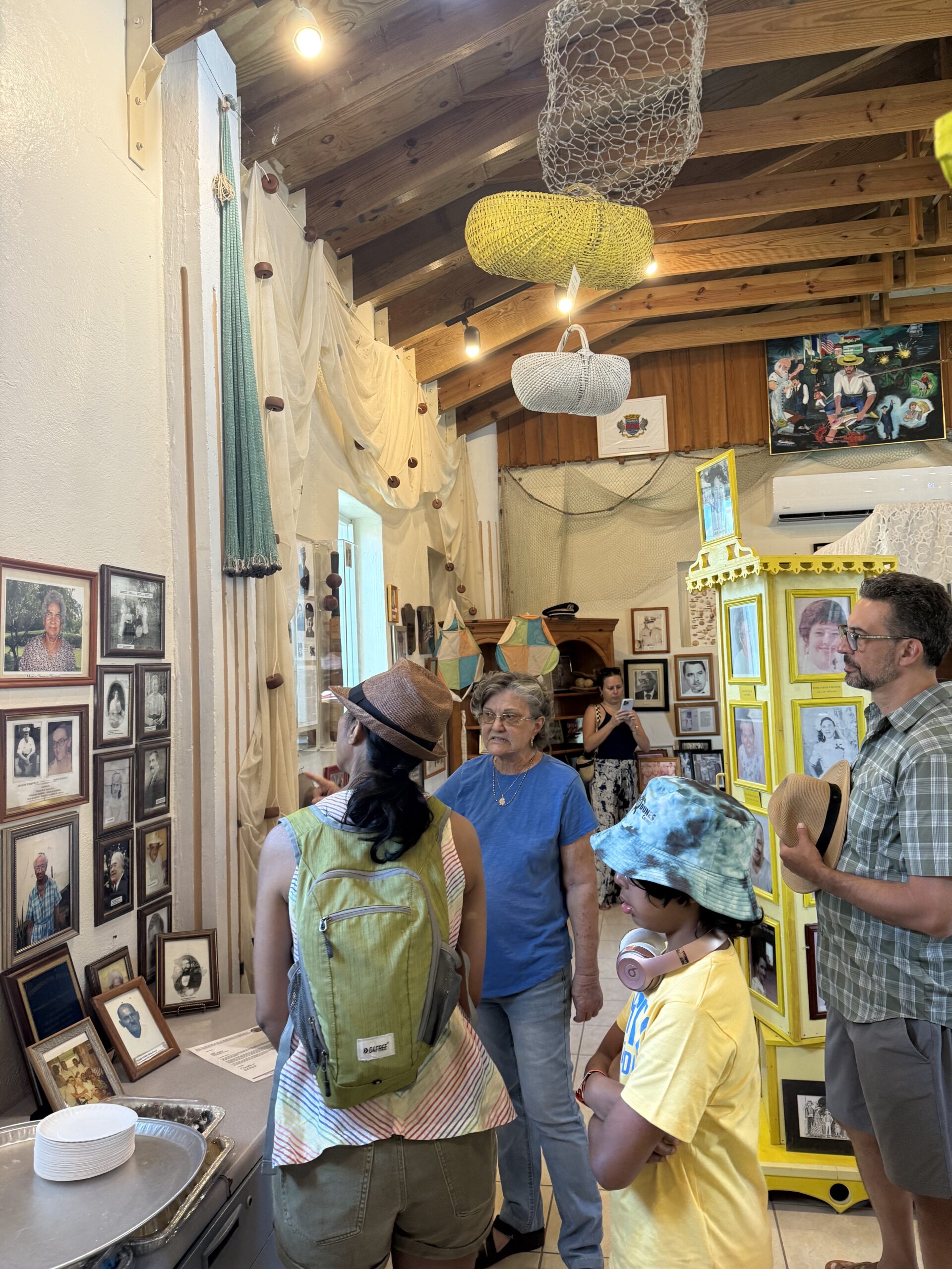 Honoree Marjorie Magras led a tour of the French Heritage Museum, sharing stories that offeredguests a glimpse into the community’s past. (Source photo by Melissa Bryan)
