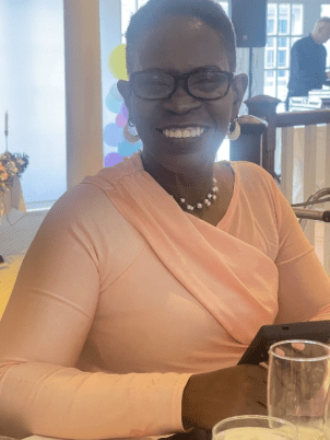 Carol M. Huggins Dies