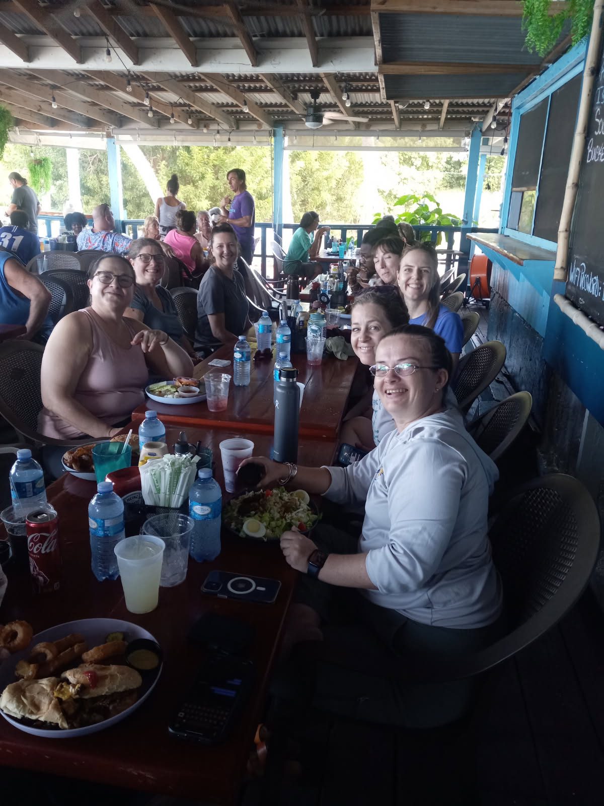 NOAA, U.S. Department of Commerce, non-profit organizations (Trust for Public Land), V.I. Territorial Park staff, and myself enjoying lunch at Cane Bay restaurant after we visited Maroon Country on foot. Our job locally was to convince the federal government that Maroon Country is worth preserving due to its ecological, historical, cultural, and marine resources. (Photo by Olasee Davis)