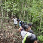 Olasee Davis leads a hike