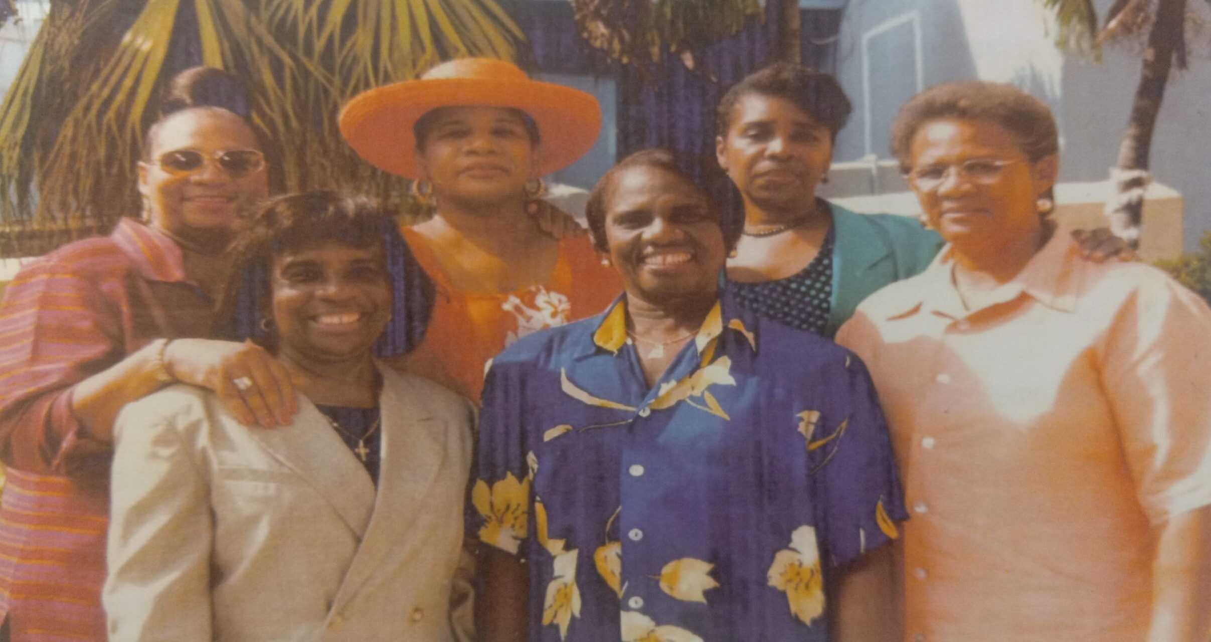 Francine Penn-Scipio, wearing her hat, with her five sisters. (Photo courtesy Turnbull's Funeral Home and Crematory Services booklet)