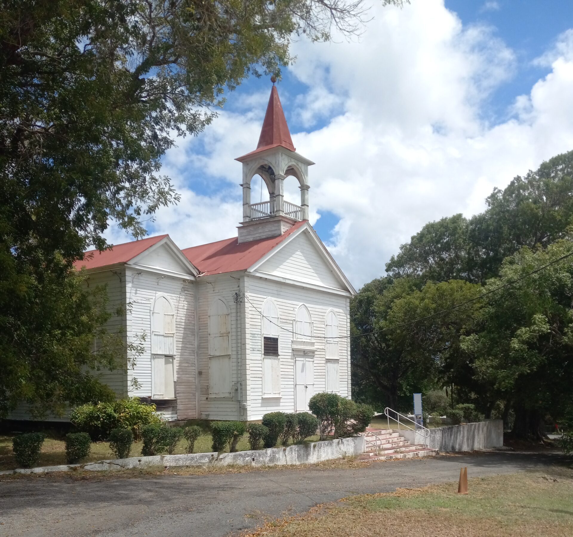Midlands Moravian Church and Manse in Friedensfeld( which means "Field of Peace in German) was the last of the three main Moravian Churches on St. Croix. It was dedicated in 1852; this lovely wood church retains its original exterior and structure built in 1801. In 2026, the church made 225-year-old. Enslaved and "free slaves" attended this church. There are few slaves' graves buried on the site of this Moravian Church. Photo by Olasee Davis 