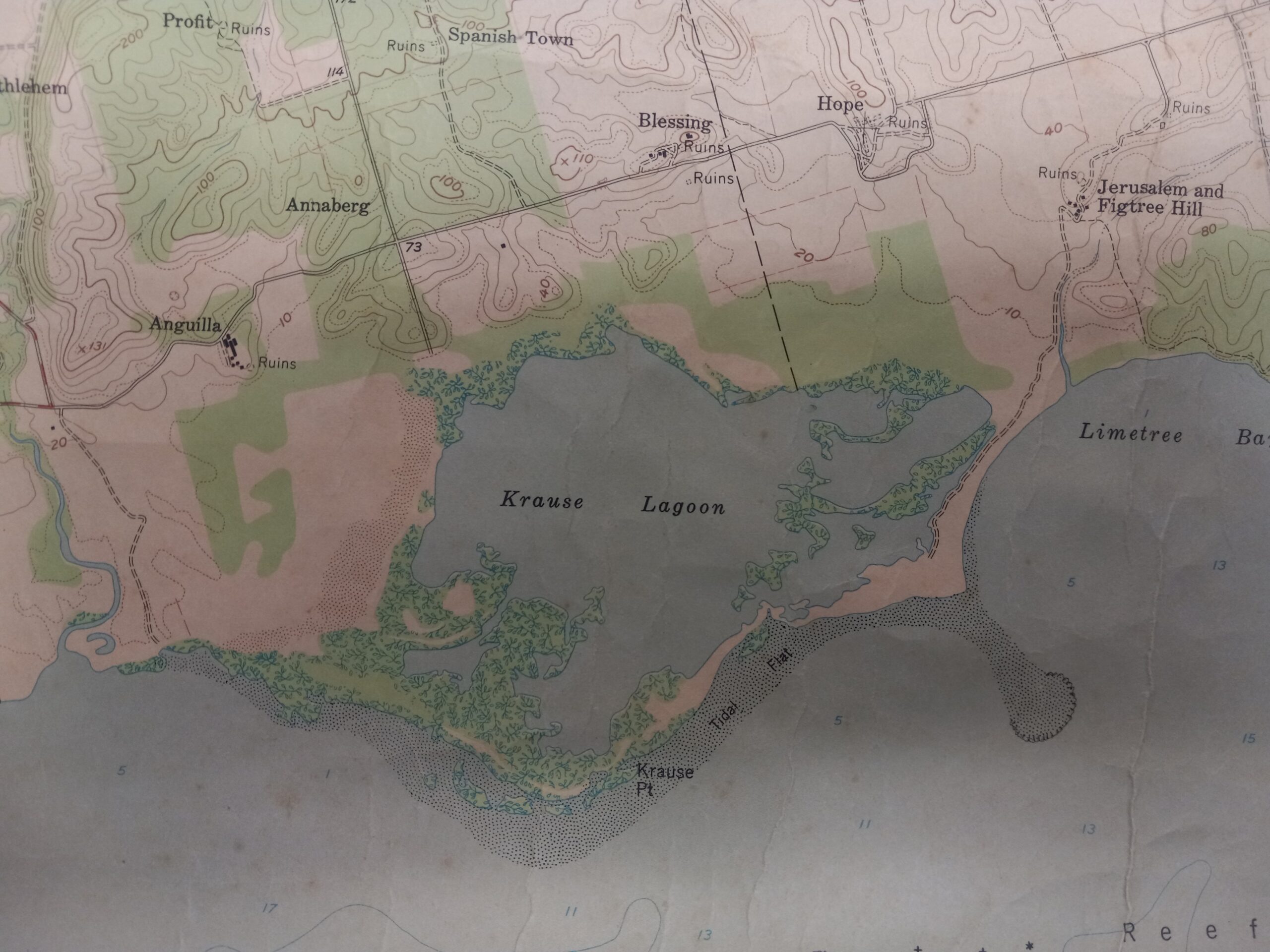 The rich black fertile soil of Anguilla Estate was bulldozed down, and the lagoon was dredged to create the south shore industrial complex. In the early 1960s, the Krause Lagoon was destroyed. (Aerial photographs map of St. Croix taken by the U.S. Geological Survey in 1954)