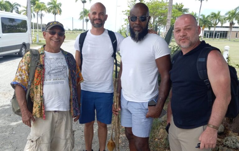 Attorney David Bornn, left, along with his three associates standing by the UVI Tech Park on St. Croix. (Photo by Olasee Davis)