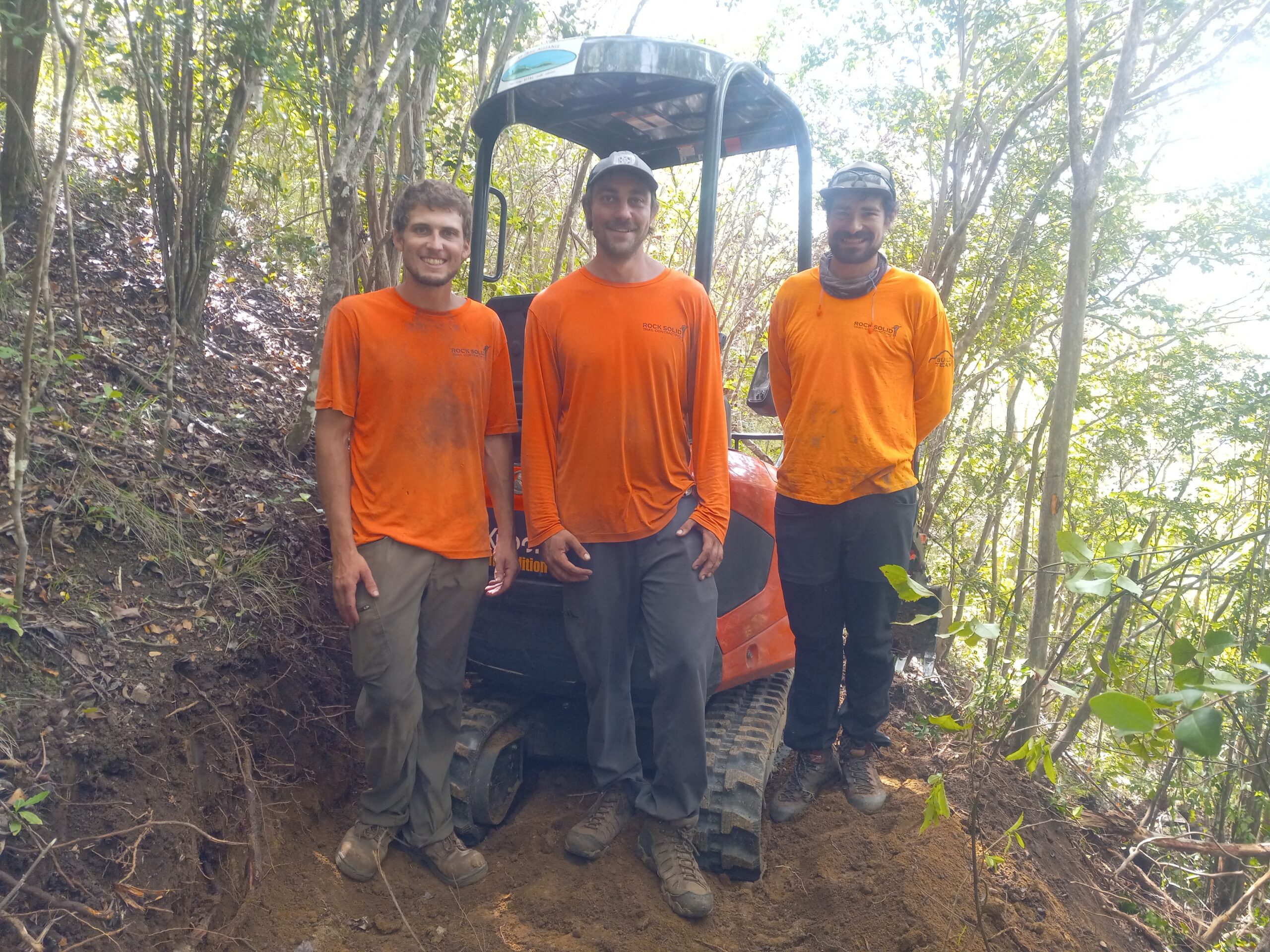 As we continued to hike, we came across a group of young men building trails along Mount Eagle mountain. From left are JP Donohue left, Zeb Langeweg and Nils Hempel. The Virgin Islands Trail Alliance board contacted a stateside company called Rock Solid Trail Contracting to establish mountain bike and hiking trails in certain parts of the park. (Photo by Olasee Davis)
