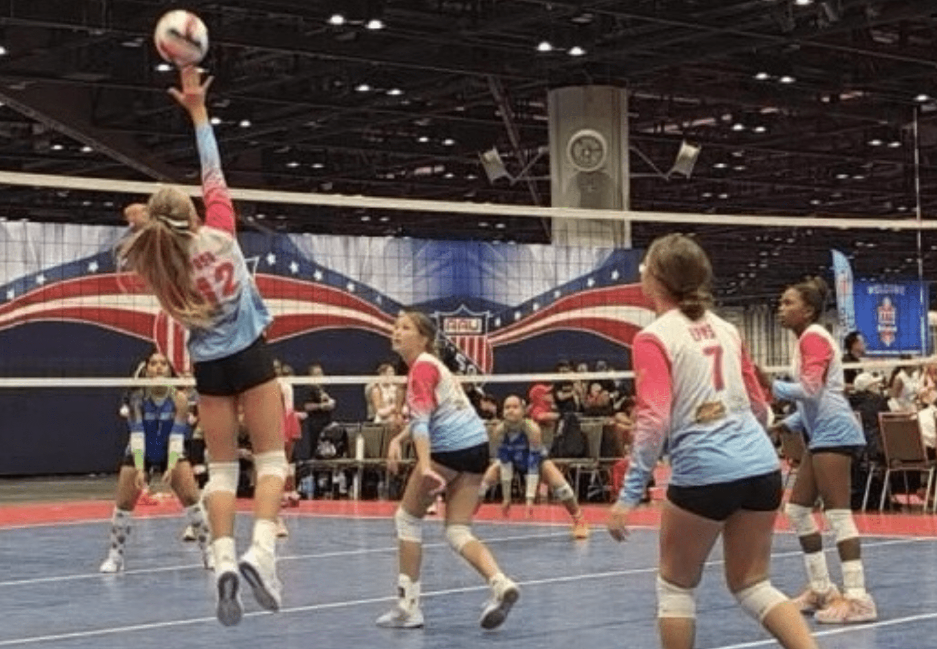 Island Mixx 13U Scarlett Poss spikes ball in her game Thursday at the 2026 AAU National Volleyball Championship. (Photo by Kimberly Poss)